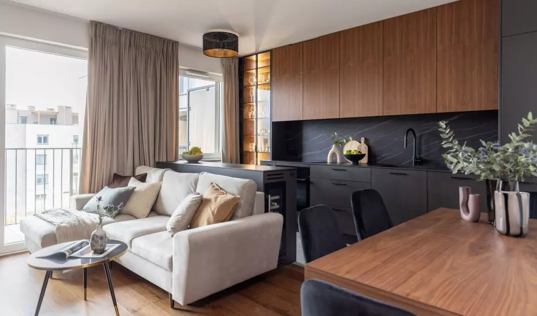 The open-plan living area consists of a kitchen, dining room and living room