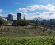 view from Swiety Marcin Street, in the background from the left: the residential and office complex on Towarowa Street, the so-called main railway station, the fairgrounds with the MTP spire