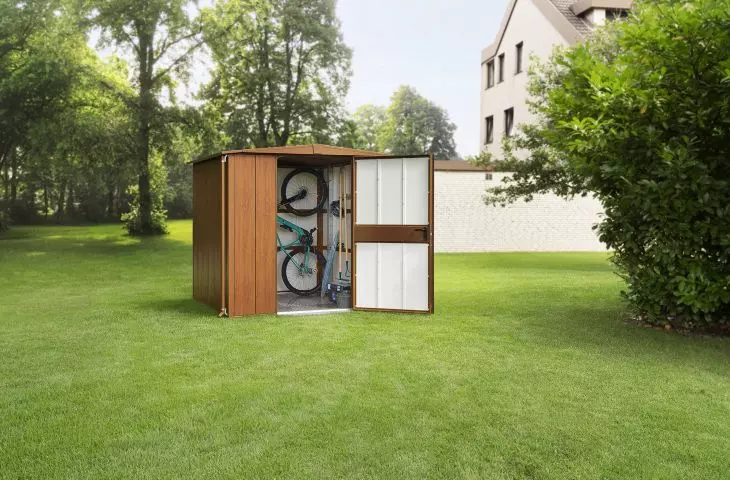 Modern garden house with gable roof with Golden Oak wood surface