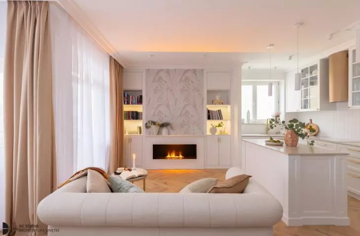 The wall above the electric fireplace was decorated with wallpaper