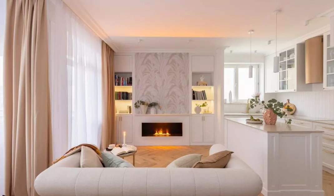 The wall above the electric fireplace was decorated with wallpaper