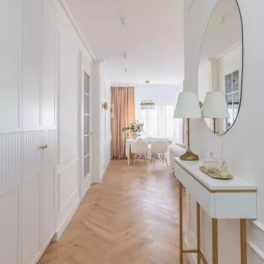 The floor in the hall was laid in herringbone pattern