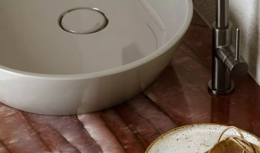 The cabinet top was made of natural red quartzite