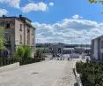 view from the PeWuKa square to the entrance from Glogowska Street, in the background - Western Railway Station pavilion, on the right - the administrative building, on the left - Hall No. 2