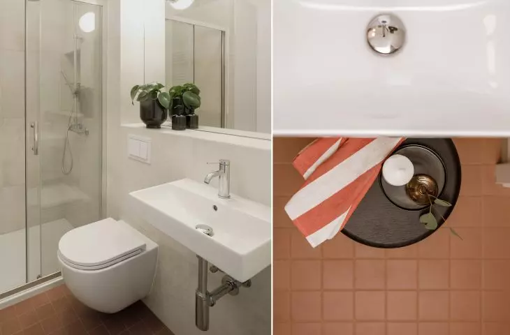 The bathroom floor has a terracotta shade