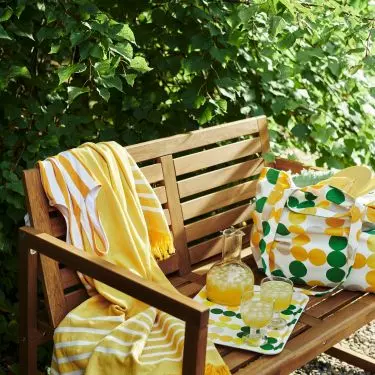 A simple wooden bench will be the perfect choice for a retro-style garden