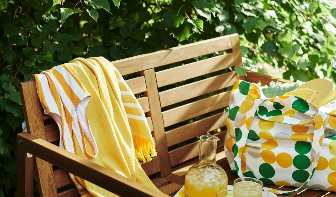 A simple wooden bench will be the perfect choice for a retro-style garden