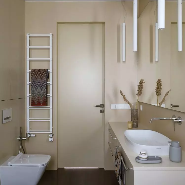 The arrangement is completed with gray accessories and white lighting
