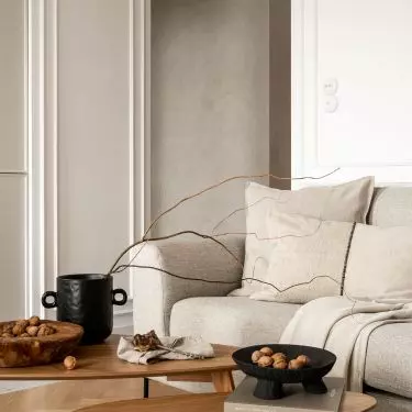 In the living room there is a soft corner sofa 
