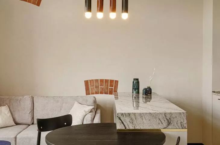stylish Nopp chairs designed by BUCK.STUDIO were placed at the table