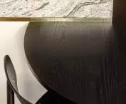 detail of the connection between the kitchen island and the table