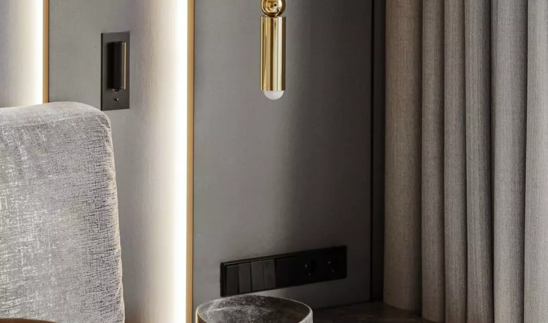 Bedside tables have stone tops