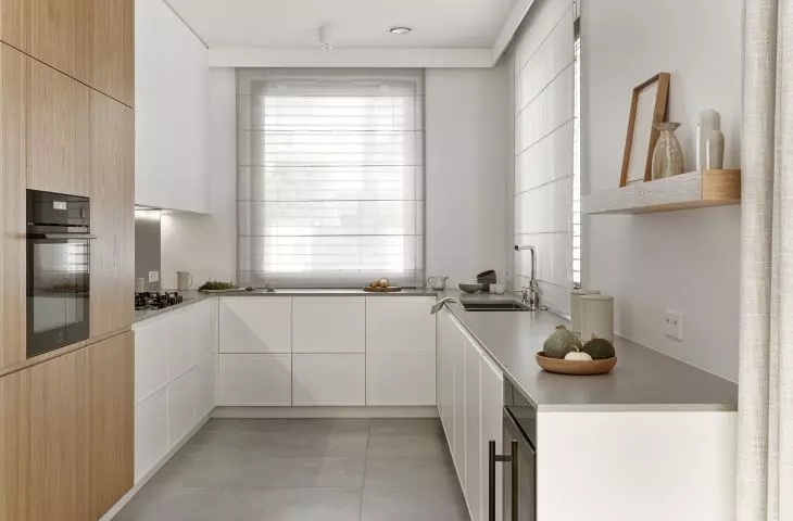 The kitchen cabinet is U-shaped