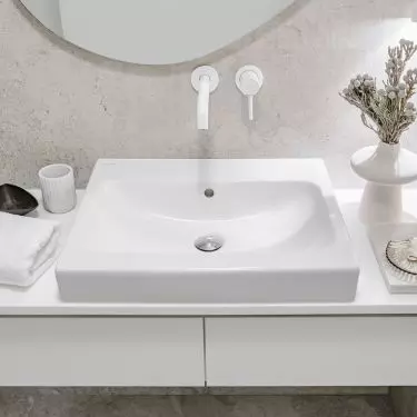 The bathroom also performs household functions therefore a larger washbasin was used