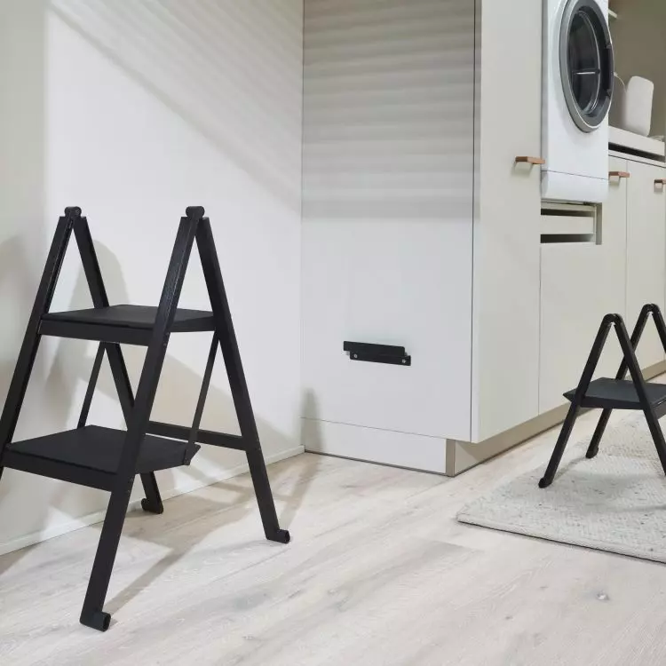Practical ladder will allow you to reach even the highest shelves