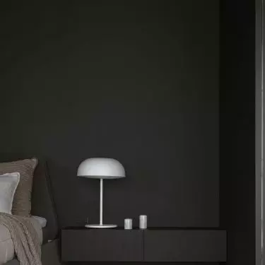 There are two versions of lamps on the bedside tables