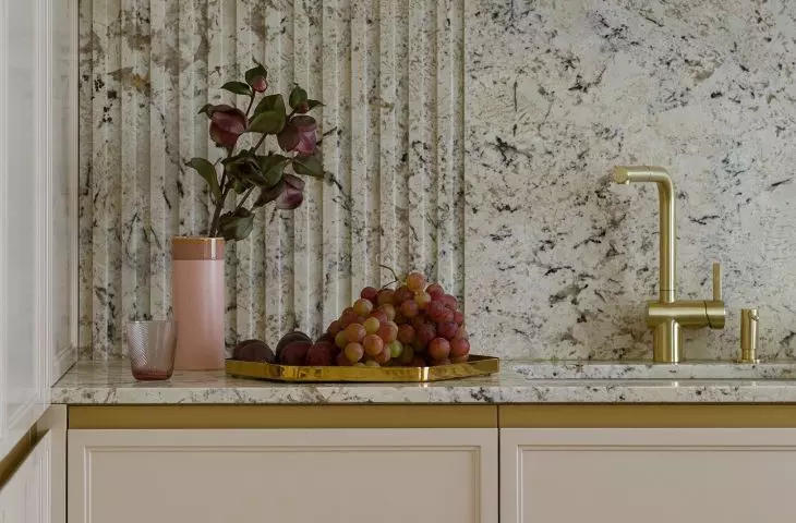 Walls and countertops are covered with natural stone