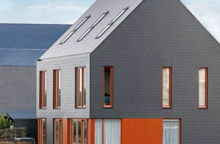 Cedral tile in graphite color on roof and facade - double coverage