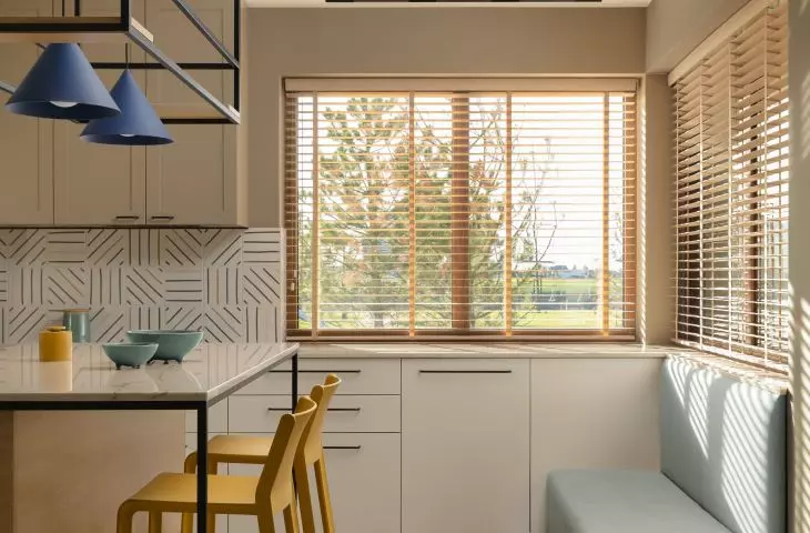 The investor wanted an upholstered bench in the kitchen