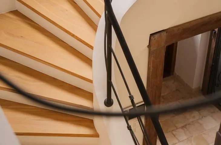 The interior is dominated by muted colors and natural materials