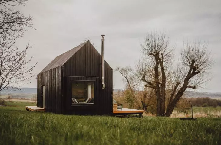 The cottage is planned on a rectangular plan and topped with a gable roof