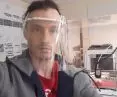 Architect Michal Polak with a visor composed of a band and protective film.