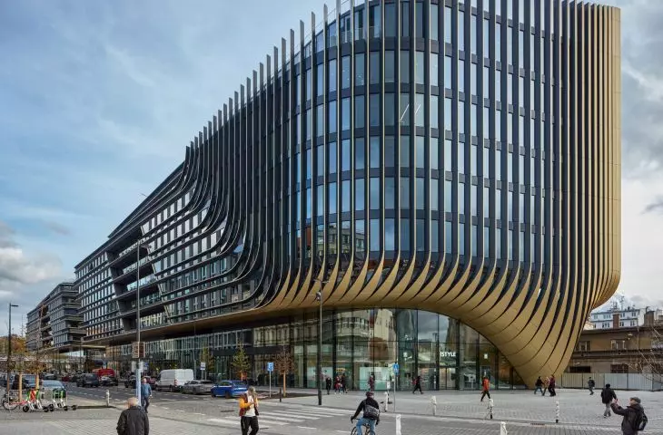 Striped waves on the facade go from horizontal to vertical