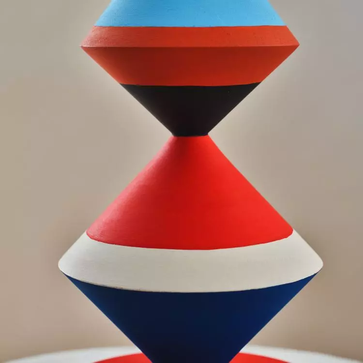 Totems are painted by hand