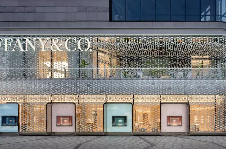Strings of glass diamonds hang between the display cases