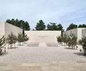 the yards of the columbarium chambers and the cemetery square were spread with permeable material - local stone ballast
