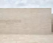 the central wall of the square is adorned with a line from Jan Kochanowski's trene describing the emptiness felt by the poet after the loss of his daughter