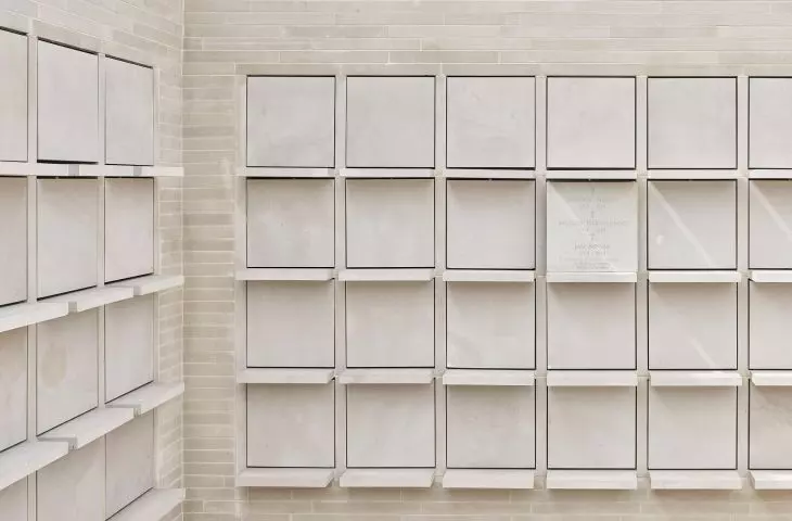 shelves and arrays with hidden fasteners that allow niches to open and close are made of sandstone