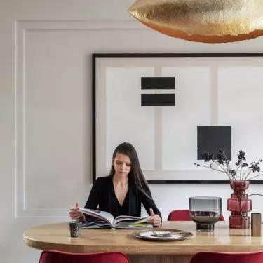 Dining room stands out against neutral arrangement