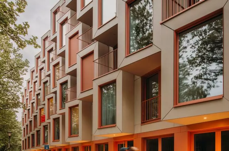 The facade reflects the modular nature of the interior of the residential block