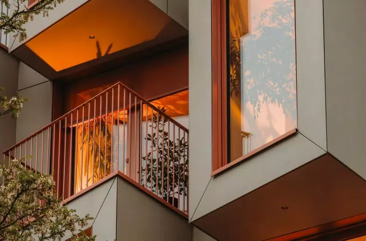 Use of balconies on bay windows maximizes use of facade