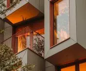 Use of balconies on bay windows maximizes use of facade