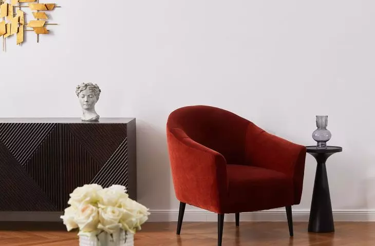 Red armchair will add character to the interior
