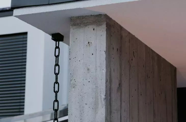 Reinforced concrete walls stood on two sides of the house