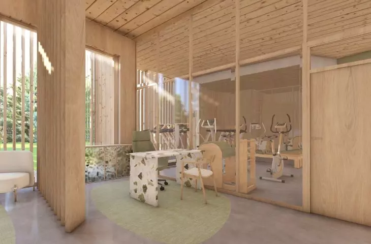 gabinet fizjoterapeuty – biuro i widok na siłownię 