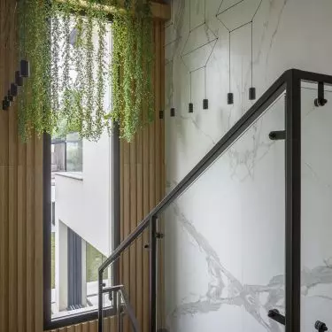 A unique staircase leads to the private area