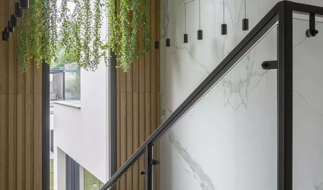 A unique staircase leads to the private area