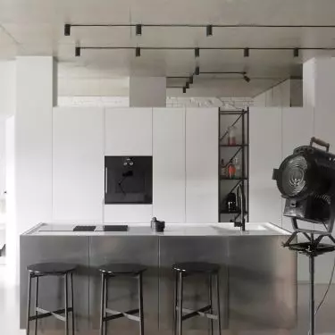 Black fixtures highlight minimalist kitchen design