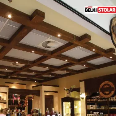 Installation of rustic beams on the ceiling