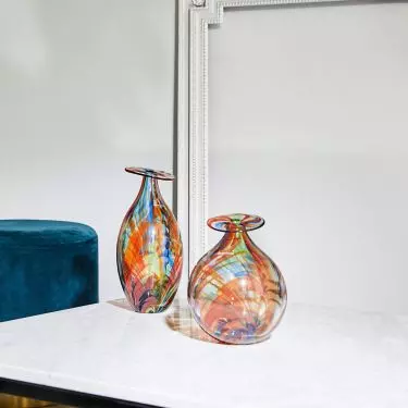 Colored glass vases can be decorative even without flowers