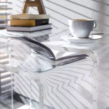 UCCOI®'s bestseller, the u-shaped transparent forms can be found as tables, stools, consoles, bedside tables, helpers, displays and much more