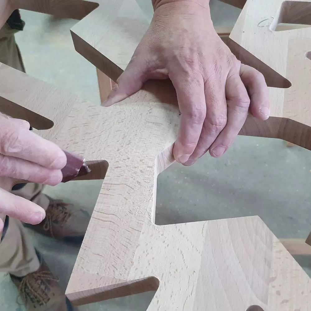  Hand finishing of beech openwork railing