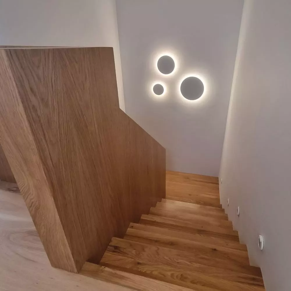 Oak carpet stairs on concrete structure