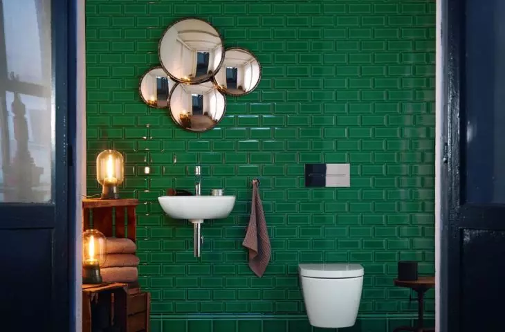 Tiles: Tiles are a functional and aesthetically pleasing way to bring green into a bathroom. For example, emerald green tiles paired with a white ME by Starck sink by Duravit create a luxurious and stylish atmosphere