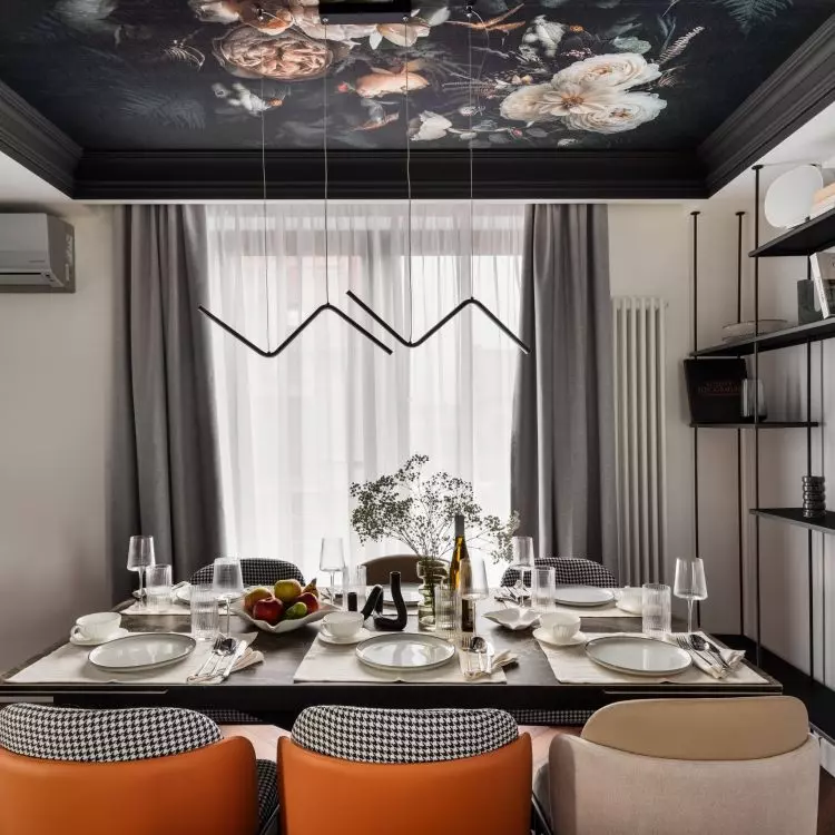 The ceiling in the dining area was decorated with patterned wallpaper