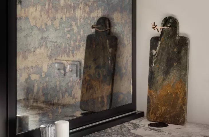The illuminated bookcase was hidden behind the countertop